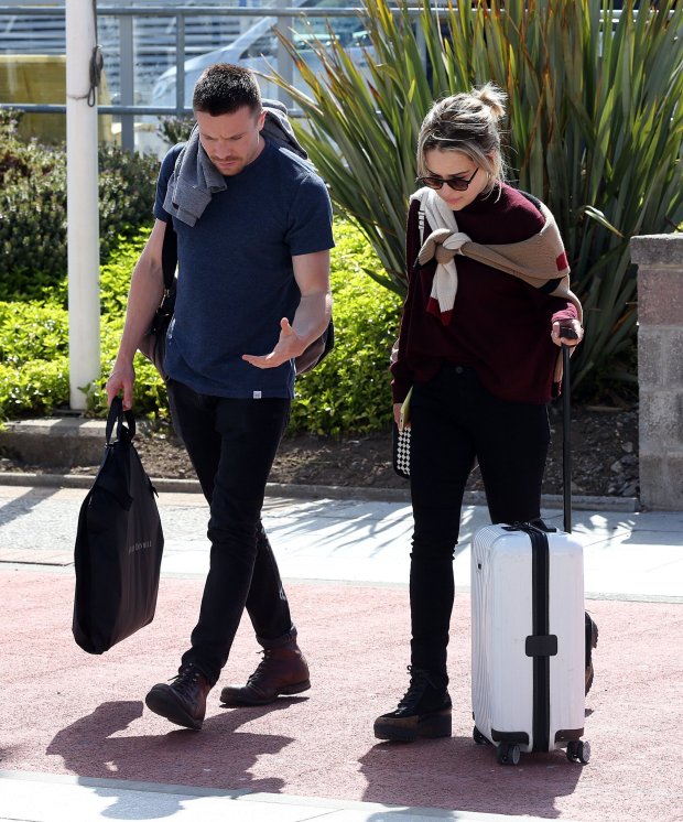 Game of Throne stars leave after the wedding of Kit Harington and Rose Leslie in Aberdeenshire . Pic shows Emilia Clarke and Joe Dempsie at Aberdeen airport. Pic Karen Murray
