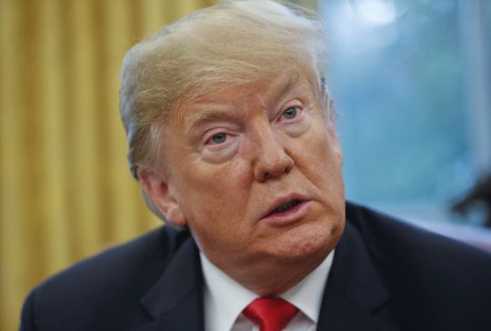 President Donald Trump pauses during his meeting to discuss potential damage from Hurricane Michael, in the Oval Office of the White House in Washington, Wednesday, Oct. 10, 2018. (AP Photo/Pablo Martinez Monsivais)
