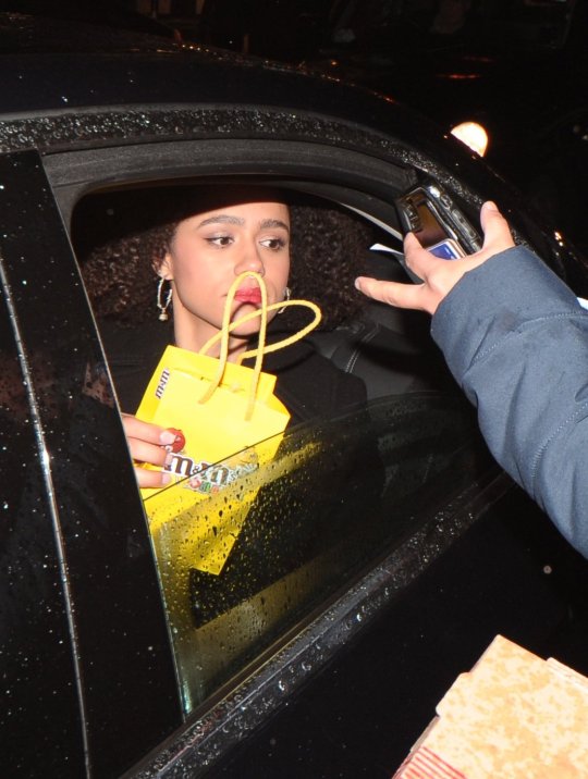 Nathalie Emmanuel is clearly physically shaken and close to tears when autograph hunters surround her demanding autographs and putting pens in her face at the La Boheme - VIP performance at the london coliseum, something was said to her as she tried to get into her car and she just wanted to get away from the pack of autographers. one nice fan gave her a present of m and m sweets, once safely in the car she signed for a few collectors