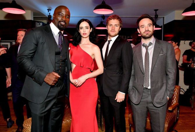 (L-R) Mike Colter, Krysten Ritter, Finn Jones and Charlie Cox attend the 'Marvel's The Defenders' New York Premiere - After Party at The Standard Biergarten on July 31, 2017.