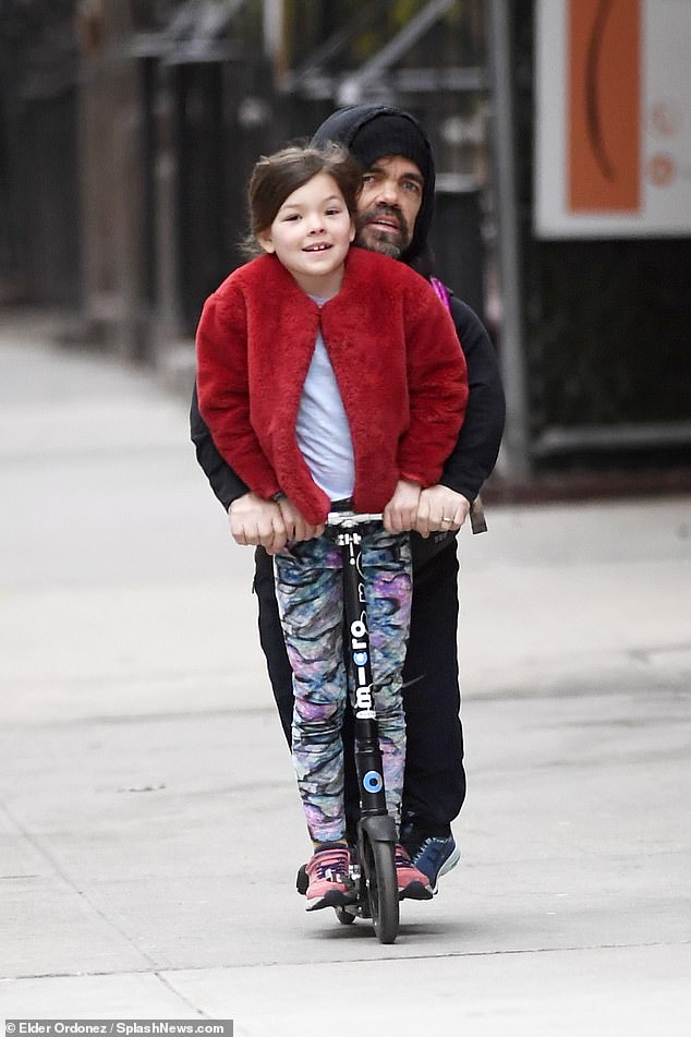 So cute! Peter Dinklage, 49, attracted attention as he and his daughter shared a sweet moment as they rolled around on a scooter in New York on Friday