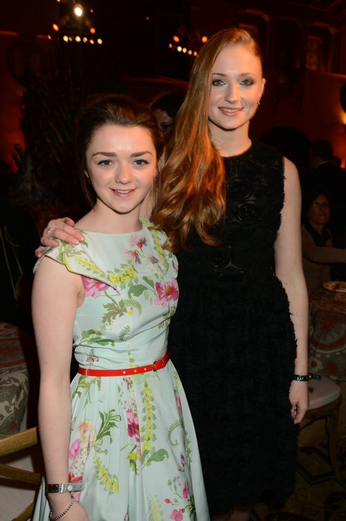 HOLLYWOOD, CA - MARCH 18: Actress Maisie Williams and actress Sophie Turner arrive to HBO's "Game Of Thrones" Los Angeles Premiere at TCL Chinese Theatre on March 18, 2013 in Hollywood, California. (Photo by Jeff Kravitz/FilmMagic)