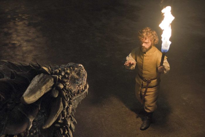 Tyrion walks up to a dragon.