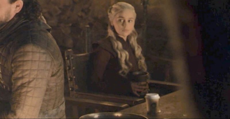 Emilia Clarke and the coffee cup