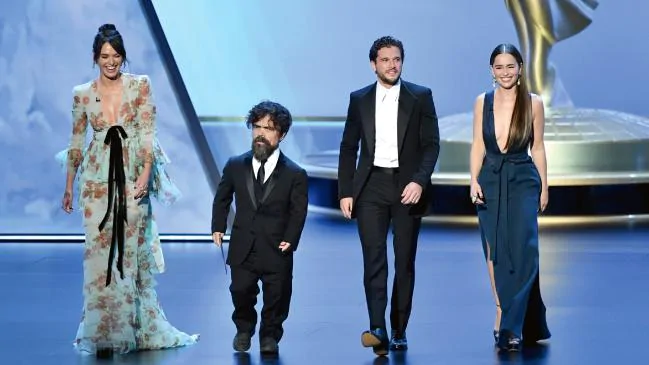 Clarke with her Game of Throne’s co-stars Lena Heady, Peter Dinklage and Kit Harington at the Emmys last month. (Picture: Getty Images)
