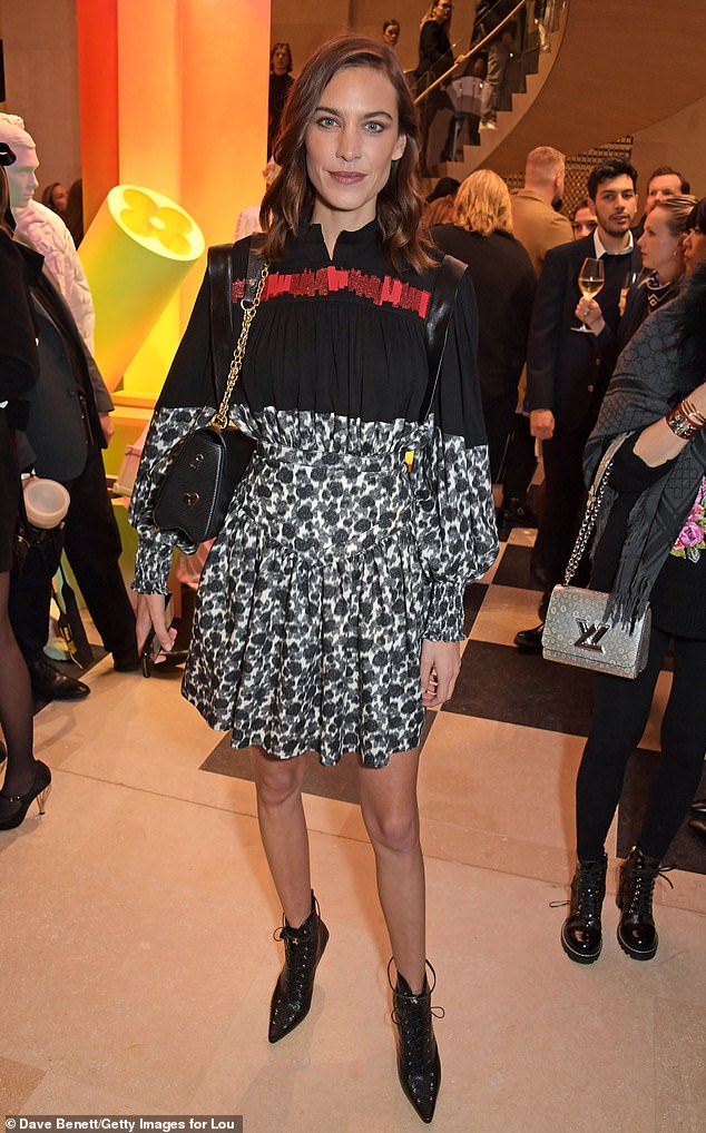 Leggy: Alexa Chung showed off her honed legs as she posed in leather stiletto boots