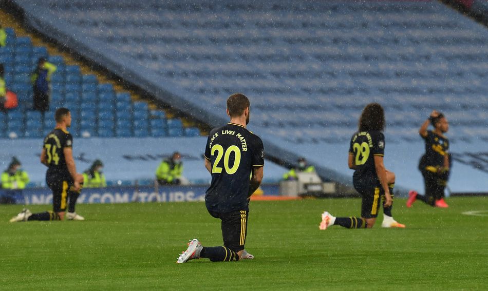 Shkodran Mustafi of Arsenal takes the knee in support of Black Lives Matter.