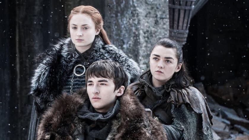 Arya, Bran, and Sansa Stark from Game of Thrones.