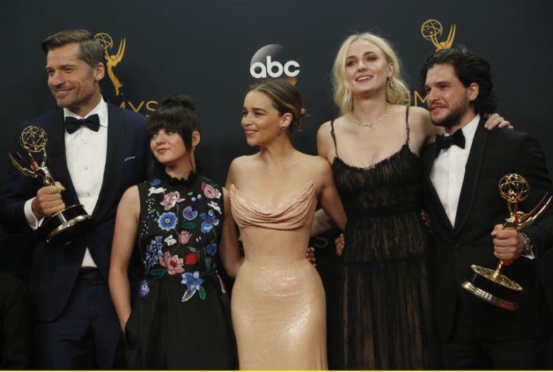 Nikolaj Coster-Waldau (L), Maisie Williams, Emilia Clarke, Sophie Turner and Kit Harrington of HBO's "Game of Thrones" pose backstage with their award for Oustanding Drama Series at the 68th Primetime Emmy Awards in Los Angeles, California U.S., September 18, 2016. REUTERS/Mike Blake