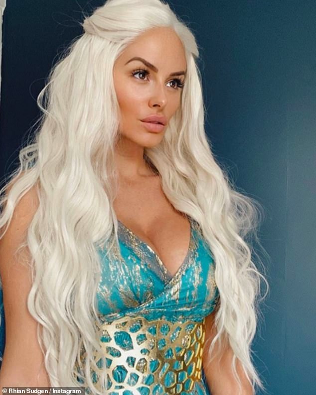 Creative: Rhian Sugden channelled the Game Of Thrones character Daenerys Targaryen in a blonde wig as she played dress up for a sultry snap on Saturday