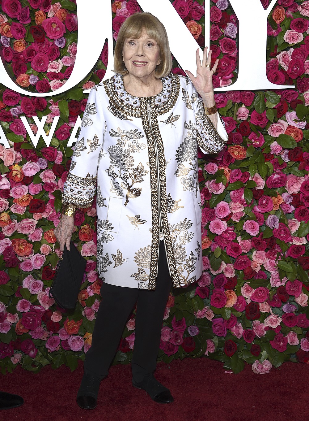 FILE - In this Sunday, June 10, 2018 file photo, Britain's Diana Rigg arrives at the 72nd annual Tony Awards at Radio City Music Hall in New York. Actress Diana Rigg, who became a 1960s style icon as secret agent Emma Peel in TV series “The Avengers,” has died at age 82. Rigg’s agent Simon Beresford says she died Thursday Sept. 10, 2020 at home with her family. (Photo by Evan Agostini/Invision/AP, File)