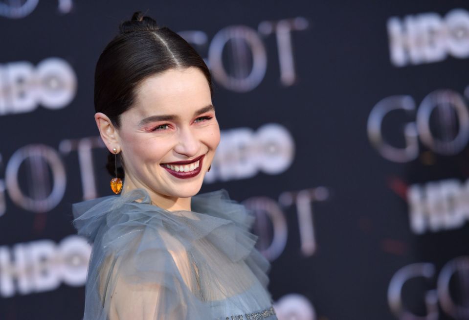 (FILES) In this file photo taken on April 3, 2019 British actress Emilia Clarke arrives for the &quot;Game of Thrones&quot; eighth and final season premiere at Radio City Music Hall in New York city. - &quot;Game of Thrones&quot; will seek to make Emmy history one final time September 22, 2019 when television's best and brightest gather at a glamorous ceremony in Los Angeles to bid farewell to a number of long-running hit shows. Despite its misfiring finale which divided fans, the fantasy epic about feuding families and flame-shooting dragons secured a whopping 32 nominations for this year's Emmys -- television's version of the Oscars. The most decorated fictional show in Emmys history, &quot;Thrones&quot; has twice won 12 awards in a single season. (Photo by Angela Weiss / AFP)        (Photo credit should read ANGELA WEISS/AFP via Getty Images)