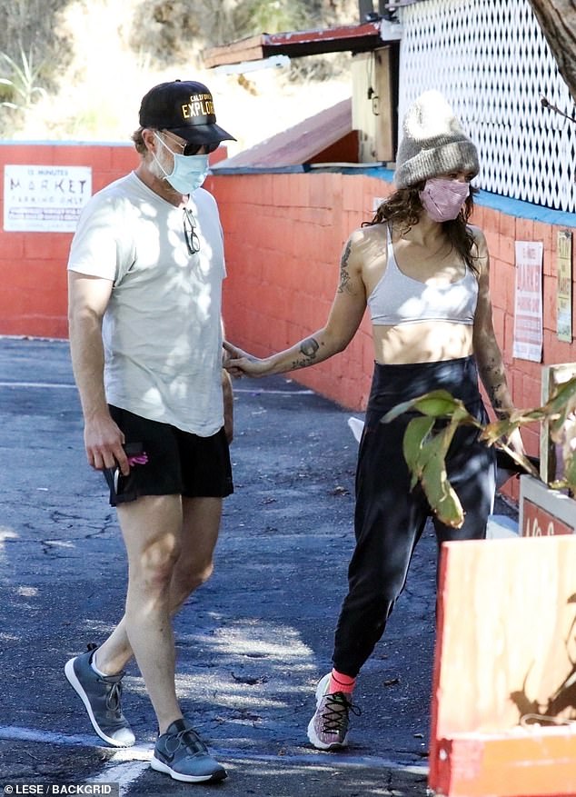 New couple? Lena Heady appeared to confirm a romance with Ozark's Marc Menchaca as they stepped out after a morning workout session in Los Angeles on Wednesday