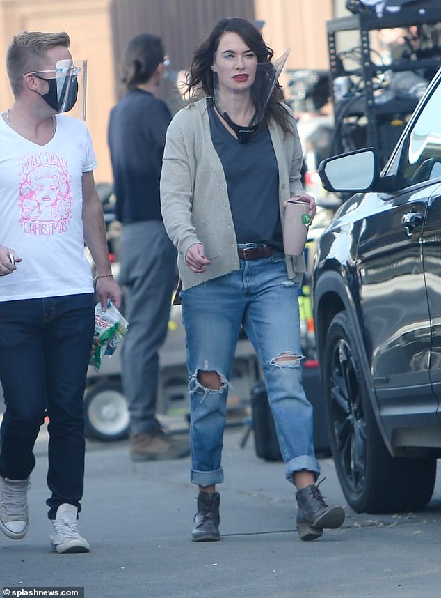 Casual cool: Lena then slipped into a t-shirt, jeans and ankle boots for her next take