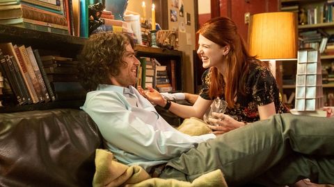 the time traveler's wife for hbo max, rose leslie and theo james sit on a sofa together