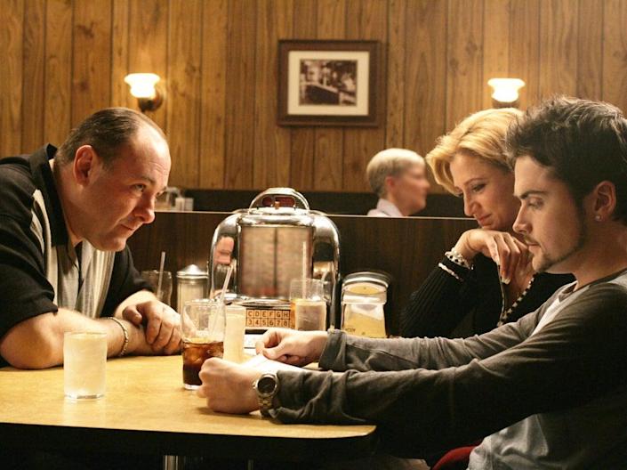 Don&#x002019;t stop believing: Tony (James Gandolfini), Carmela (Edie Falco) and AJ (Robert Iler) enjoy a final family dinner (Rex, HBO)