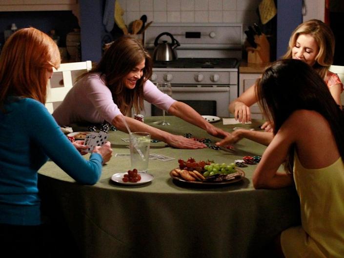 The gang sits around a table in the blandly happy Desperate Housewives finale (ABC)