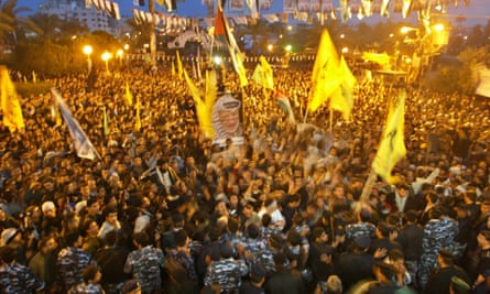 Palestinian members of the Fatah movement chant pro-Mahmoud Abbas slogans during a rally in the Gaza Strip in 2004.