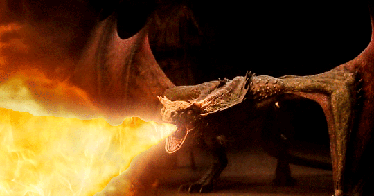 A dragon breathing fire in HBO's House of the Dragon
