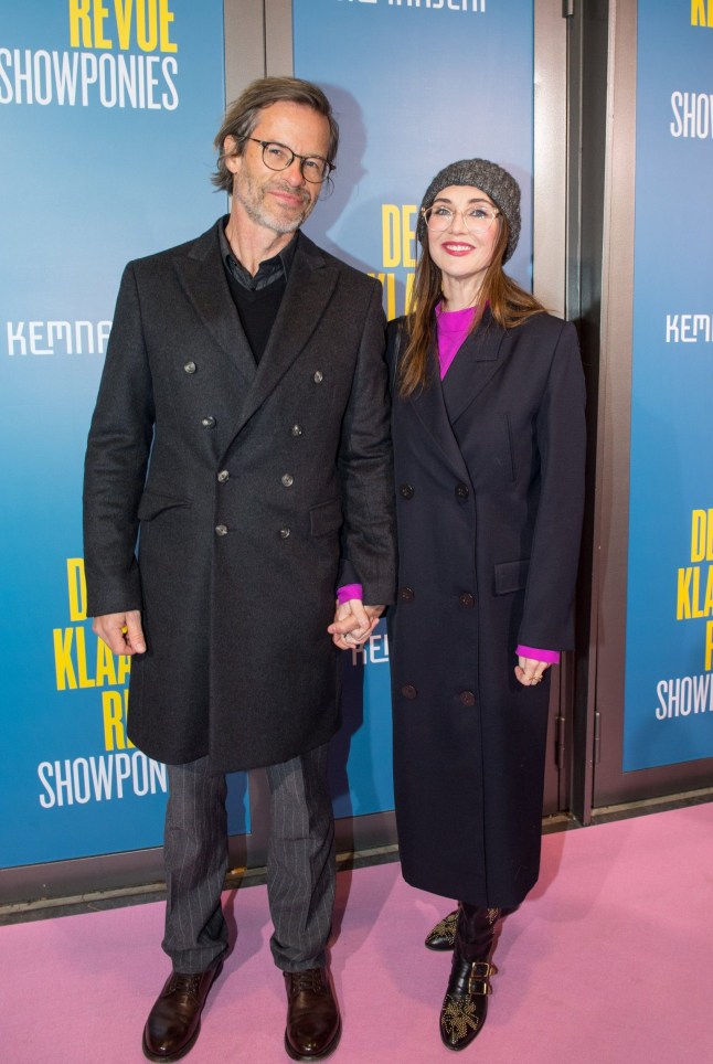 Guy Pearce and Carice van Houten on a red carpet