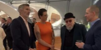 George R.R. Martin reunites with Game of Thrones showrunners and meets his “doppelganger” at star-studded museum opening
