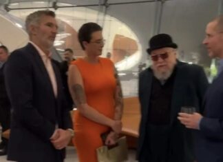 George R.R. Martin reunites with Game of Thrones showrunners and meets his “doppelganger” at star-studded museum opening